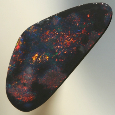 SOLID BLACK OPAL Red fire moves between black opal